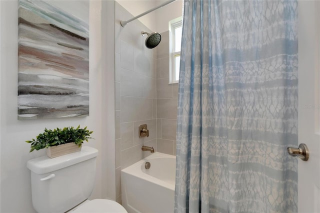 bathroom featuring toilet and shower / tub combo with curtain