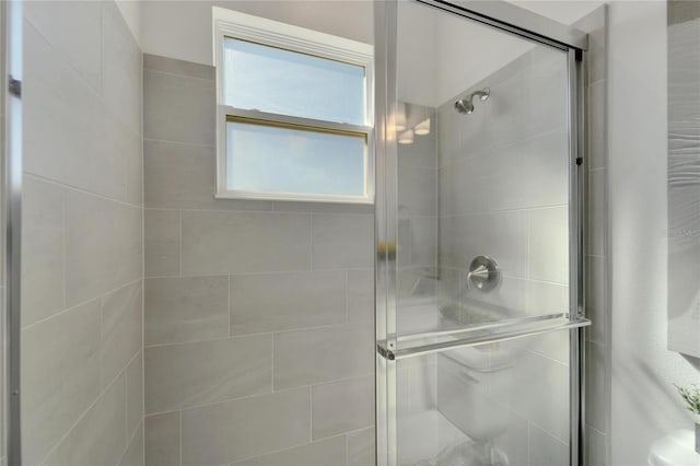 full bathroom featuring a stall shower