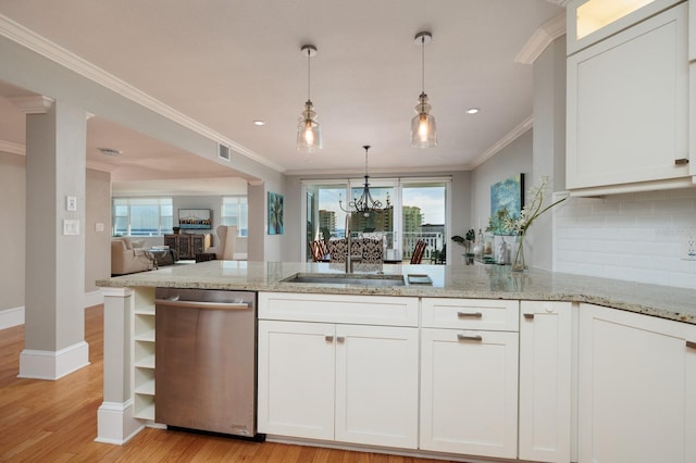 kitchen with dishwasher, sink, light stone countertops, light hardwood / wood-style floors, and white cabinetry