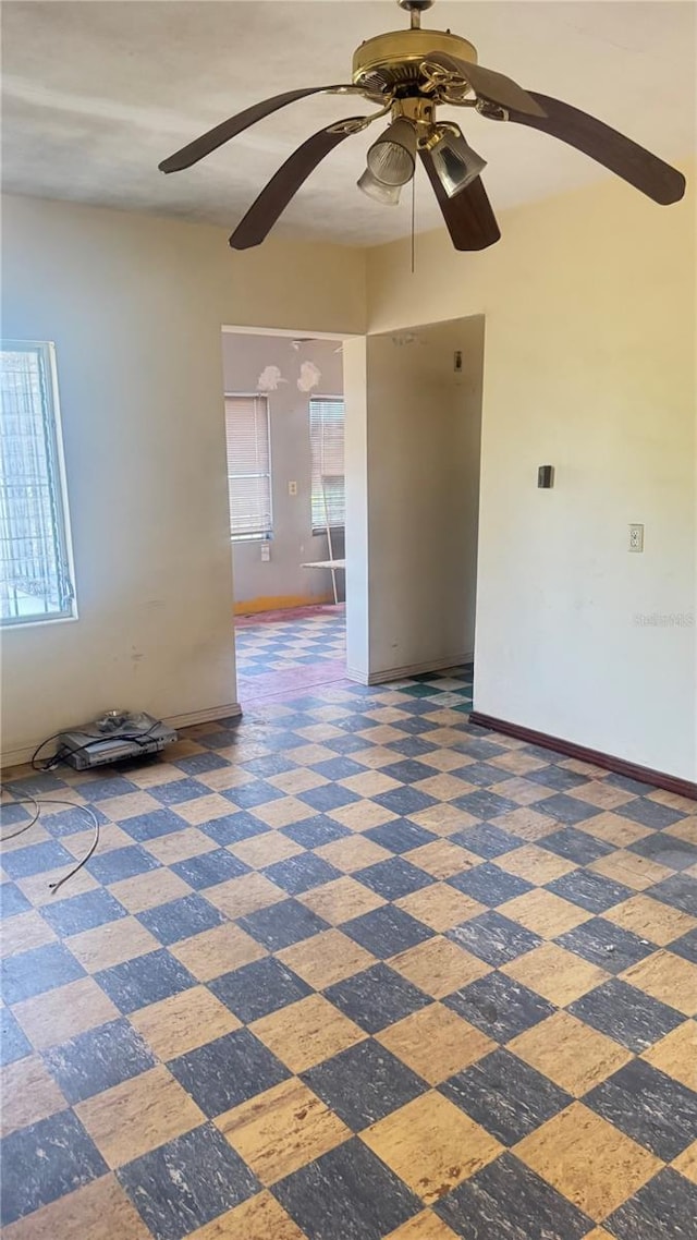 empty room featuring ceiling fan