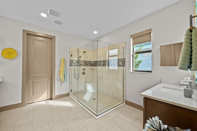 17702 Cresswind Ter, Bradenton, FL 34211 - full bath featuring baseboards, a stall shower, vanity, tile patterned flooring, and recessed lighting