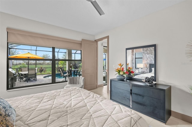 17702 Cresswind Ter, Bradenton, FL 34211 - bedroom featuring light tile patterned floors, multiple windows, baseboards, and a ceiling fan