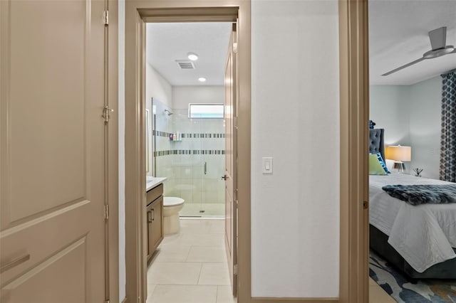 17702 Cresswind Ter, Bradenton, FL 34211 - bathroom featuring ensuite bathroom, a stall shower, vanity, tile patterned floors, and toilet