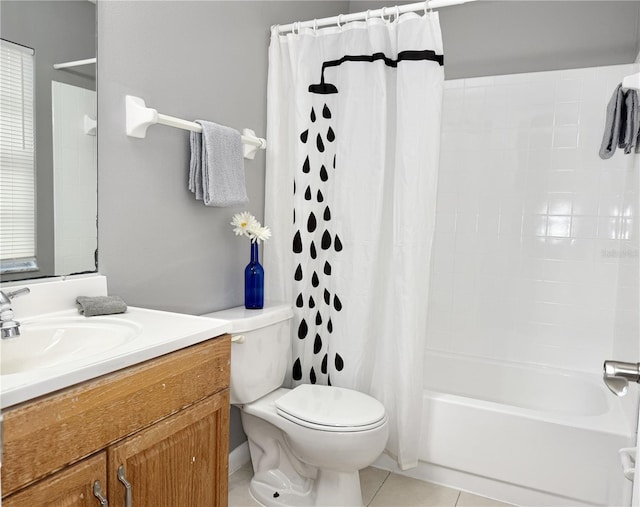 full bathroom featuring tile patterned floors, vanity, shower / bath combo, and toilet