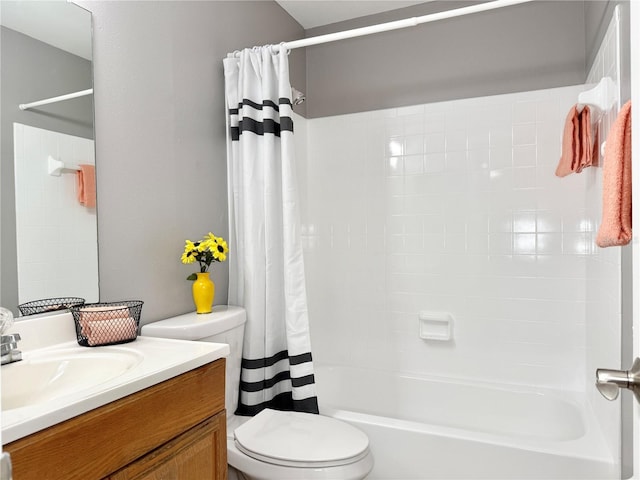 full bathroom featuring shower / bath combination with curtain, vanity, and toilet