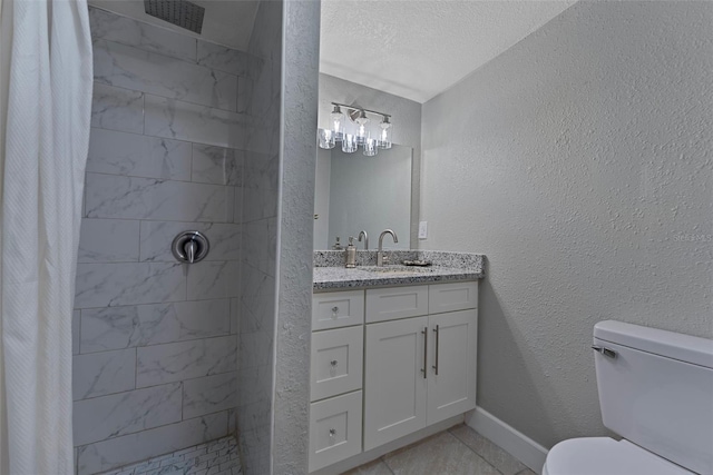 bathroom with tile patterned flooring, a textured ceiling, toilet, vanity, and a shower with shower curtain