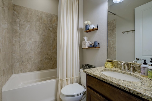 full bathroom featuring toilet, vanity, and shower / tub combo with curtain