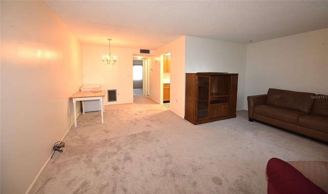 unfurnished living room with light colored carpet and a chandelier