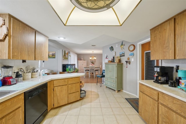 kitchen with dishwasher, a chandelier, decorative light fixtures, decorative backsplash, and light tile patterned flooring