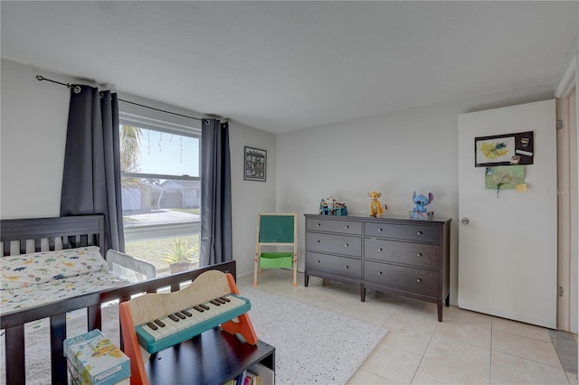 tiled bedroom with multiple windows