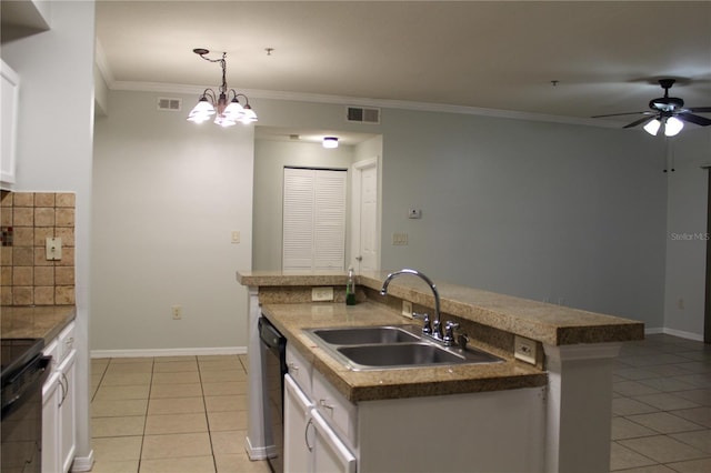 kitchen featuring crown molding, sink, decorative light fixtures, white cabinets, and light tile patterned flooring