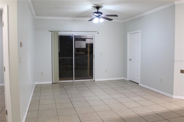 spare room featuring ceiling fan, light tile patterned floors, and ornamental molding