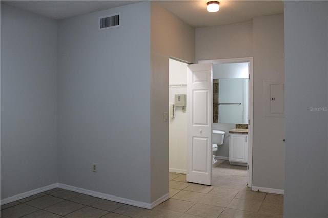 interior space with light tile patterned floors