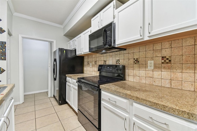 5606 Pinnacle Heights Cir Unit 304, Tampa, FL 33624 - kitchen with black appliances, ornamental molding, light countertops, white cabinetry, and light tile patterned floors