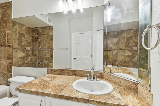 5606 Pinnacle Heights Cir Unit 304, Tampa, FL 33624 - full bathroom with toilet, a bathtub, vanity, and a shower