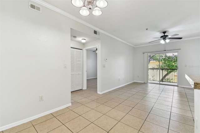 5606 Pinnacle Heights Cir Unit 304, Tampa, FL 33624 - empty room featuring a ceiling fan, crown molding, baseboards, light tile patterned floors, and a chandelier