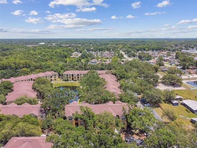 5606 Pinnacle Heights Cir Unit 304, Tampa, FL 33624 - aerial perspective of suburban area with a heavily wooded area
