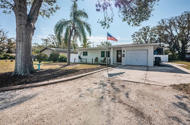 single story home featuring a garage