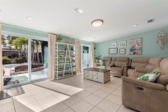 tiled living room with vaulted ceiling