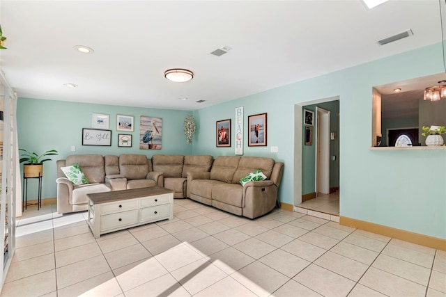 living room with light tile patterned floors