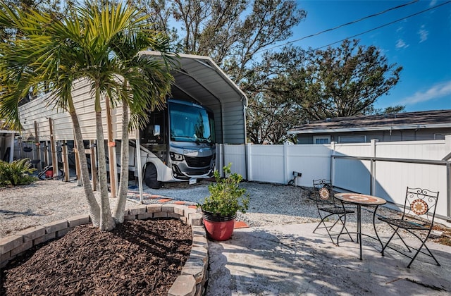 view of patio with a carport