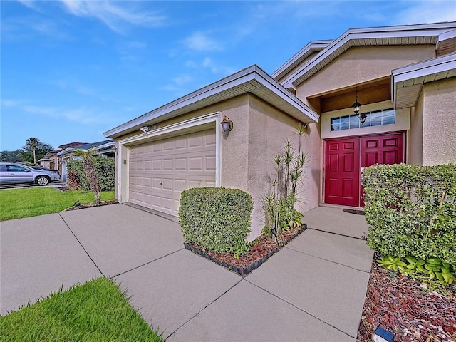 property entrance with a garage