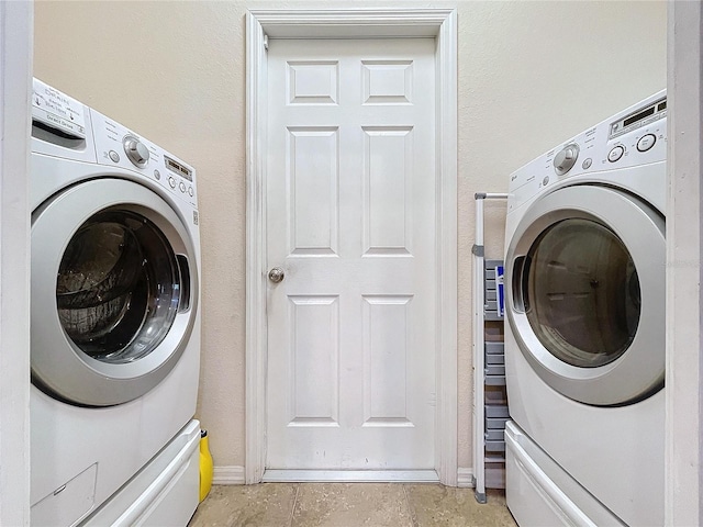 laundry room with washer / dryer