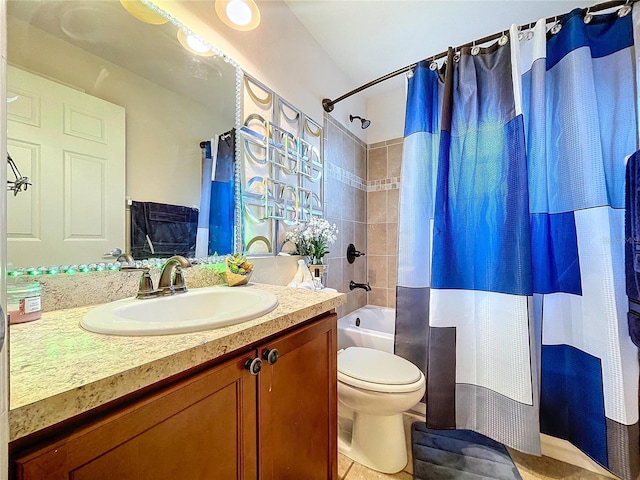 full bathroom featuring vanity, toilet, and shower / bathtub combination with curtain