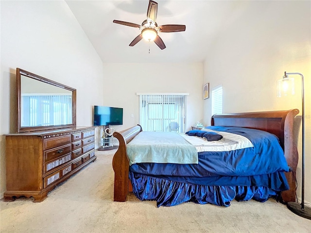 carpeted bedroom featuring ceiling fan and high vaulted ceiling