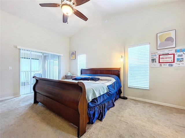 carpeted bedroom featuring ceiling fan and vaulted ceiling