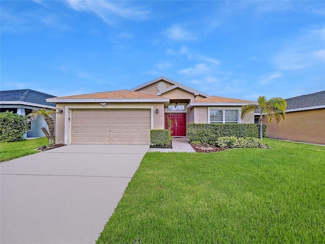 single story home with a garage and a front lawn