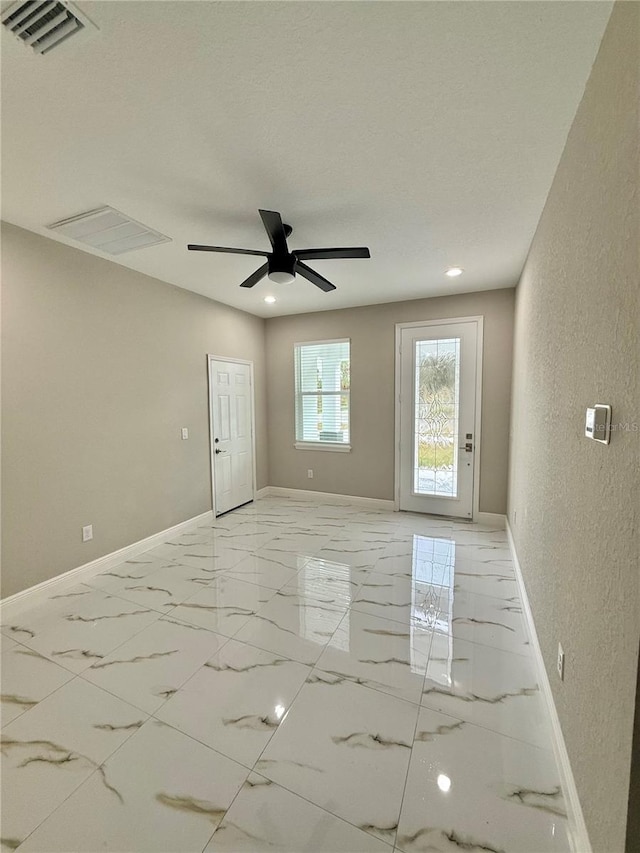 empty room with ceiling fan