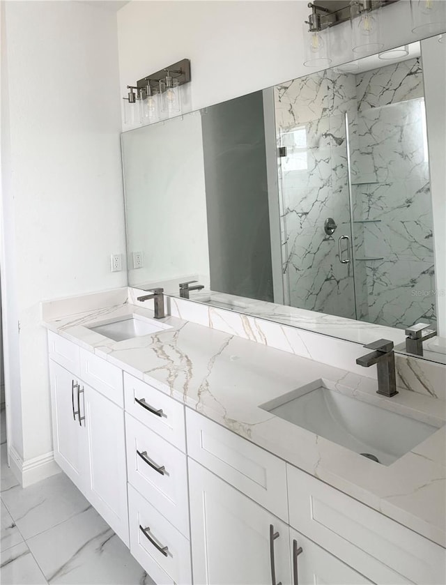 bathroom with vanity and an enclosed shower