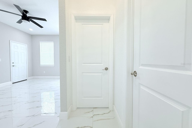 408 E Hanlon St, Tampa, FL 33604 - hallway with baseboards and marble finish floor