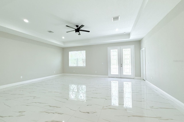 408 E Hanlon St, Tampa, FL 33604 - empty room featuring marble finish floor, baseboards, visible vents, and ceiling fan
