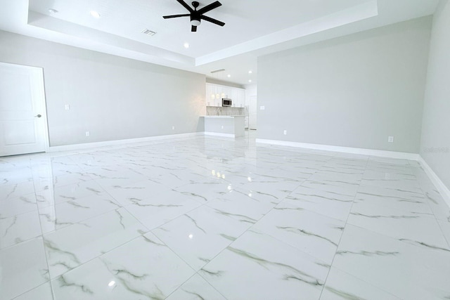 408 E Hanlon St, Tampa, FL 33604 - unfurnished living room featuring recessed lighting, baseboards, a raised ceiling, visible vents, and ceiling fan