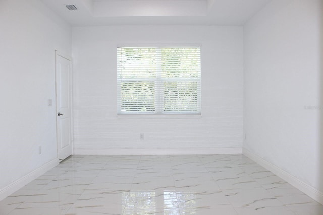 408 E Hanlon St, Tampa, FL 33604 - empty room with baseboards, marble finish floor, and visible vents