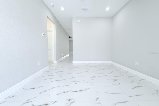 408 E Hanlon St, Tampa, FL 33604 - spare room with marble finish floor, recessed lighting, baseboards, and visible vents