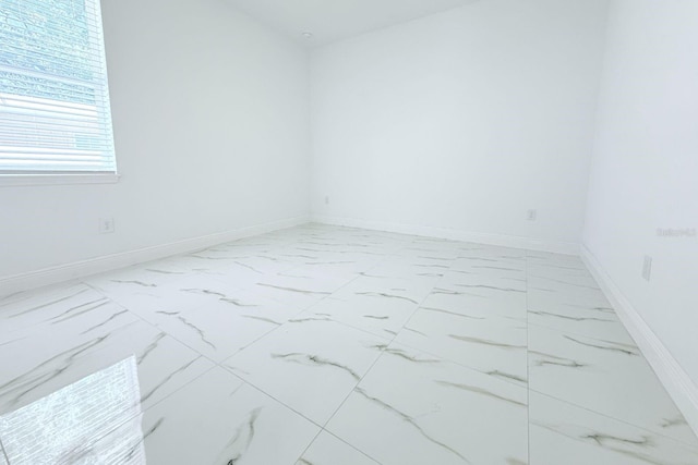 408 E Hanlon St, Tampa, FL 33604 - unfurnished room featuring marble finish floor and baseboards