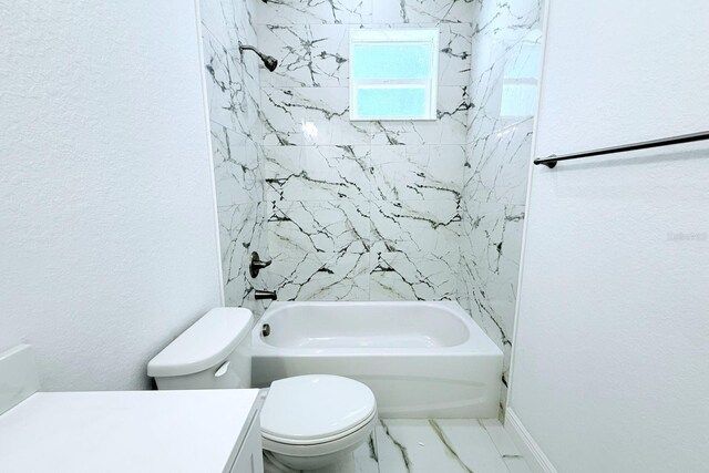 408 E Hanlon St, Tampa, FL 33604 - full bathroom featuring marble finish floor, toilet, vanity, shower / bathing tub combination, and a textured wall