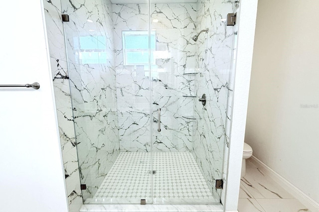 408 E Hanlon St, Tampa, FL 33604 - bathroom with marble finish floor, toilet, a marble finish shower, and baseboards