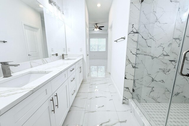 408 E Hanlon St, Tampa, FL 33604 - bathroom with marble finish floor, ceiling fan, a sink, and a marble finish shower