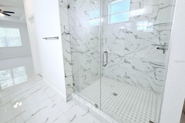 408 E Hanlon St, Tampa, FL 33604 - bathroom featuring baseboards, marble finish floor, a marble finish shower, and a ceiling fan