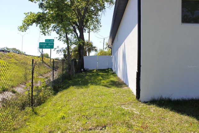 408 E Hanlon St, Tampa, FL 33604 - view of yard with a gate and fence