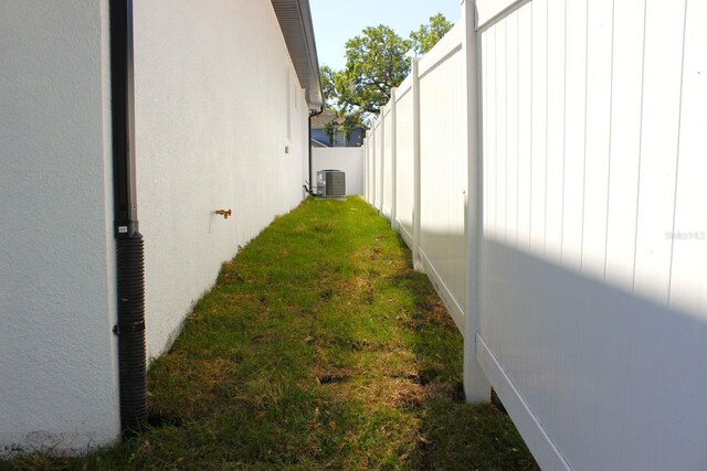 408 E Hanlon St, Tampa, FL 33604 - view of yard featuring fence and central AC