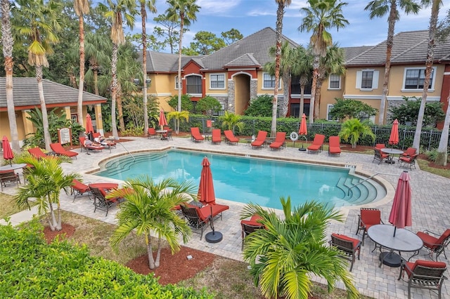 view of swimming pool with a patio