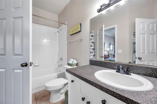 full bathroom with tile patterned flooring, vanity, toilet, and washtub / shower combination