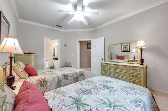 carpeted bedroom featuring ceiling fan, ornamental molding, and ensuite bath