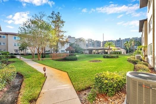 view of community with a yard