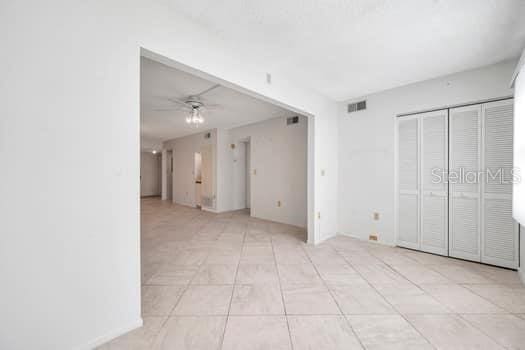 spare room with ceiling fan